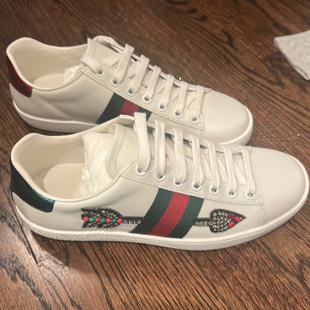 Gucci arrow ace sneakers.